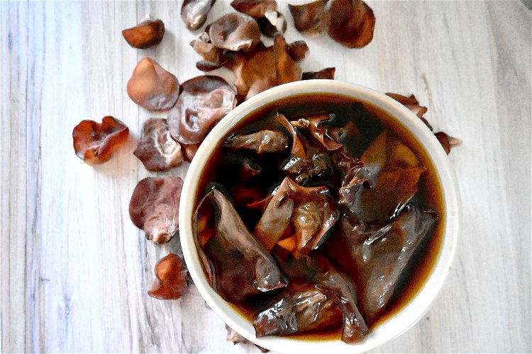 Image of Start by rehydrating the wood ear mushrooms in a bowl...