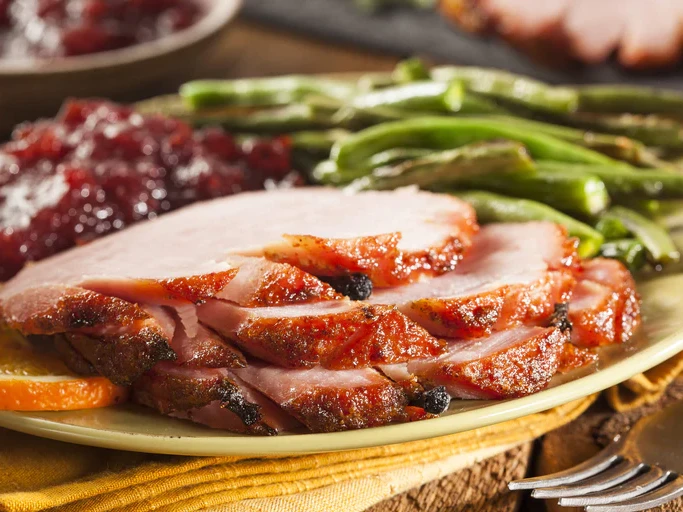 https://images.getrecipekit.com/20220729013645-spiced-honey-and-true-lemon-baked-ham_768x.webp?aspect_ratio=4:3&quality=90&