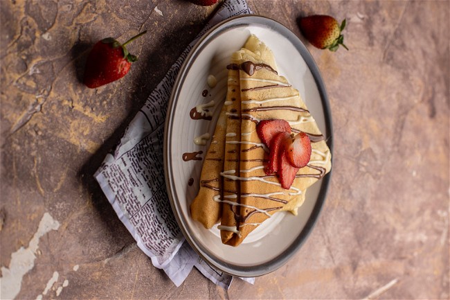 Image of Peaches & Cream Crepes