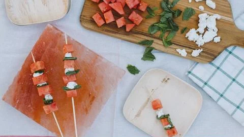 Image of Watermelon, Goat Cheese, and Mint Skewers on a Salt Block