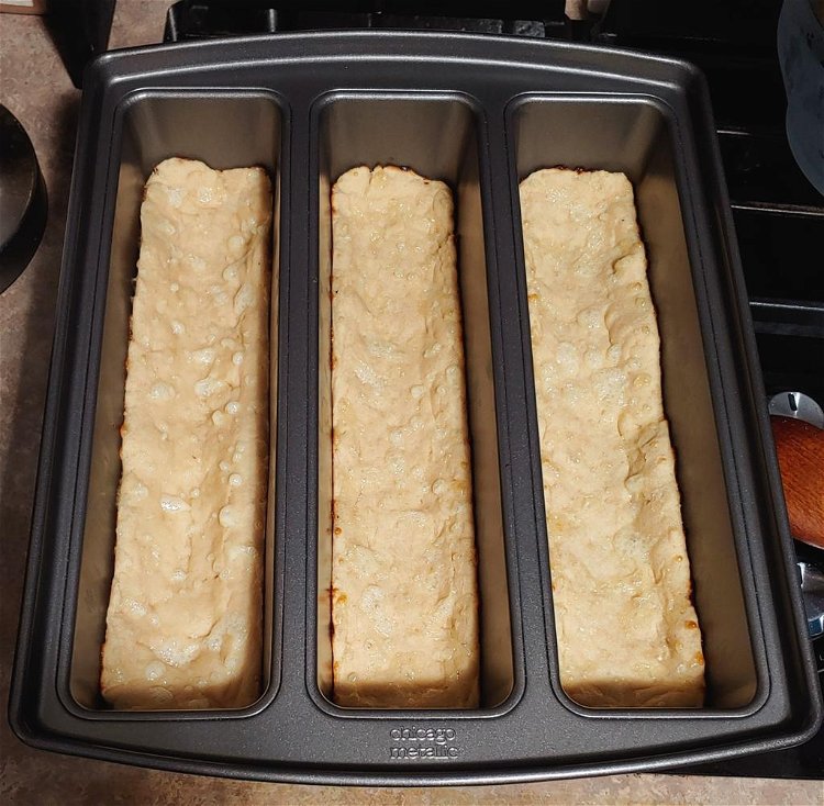Image of Par-bake the dough for 8-10 minutes before topping.