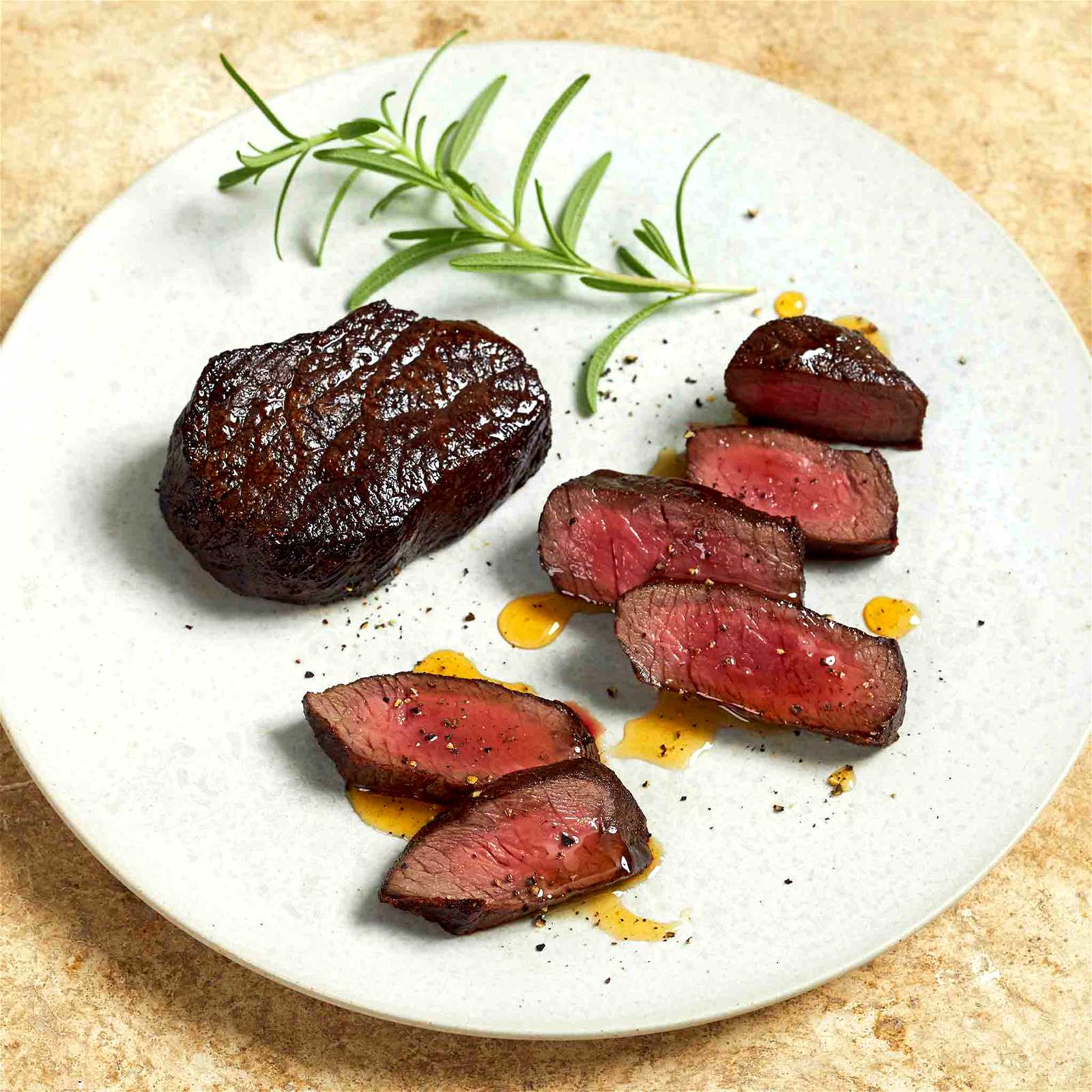 Image of Pan Seared Elk Medallions with Honey Rosemary Butter