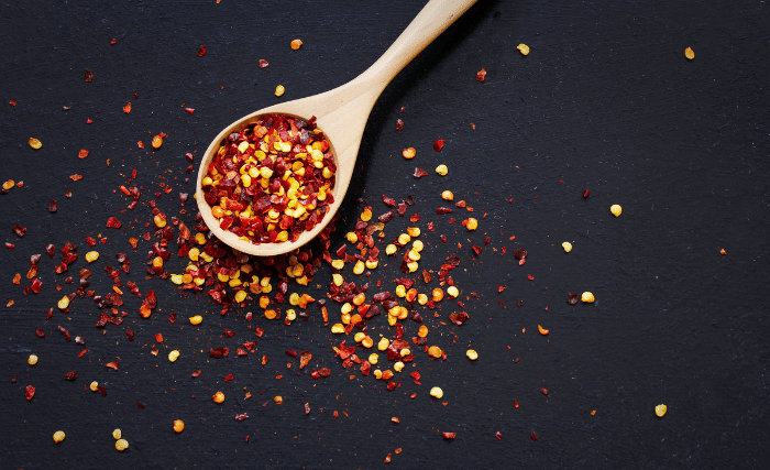 Image of Add everything to a bowl with red chili flakes, pepper...