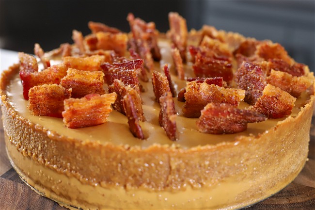 Image of Salted Caramel and Chocolate Cheesecake with Candied Bacon