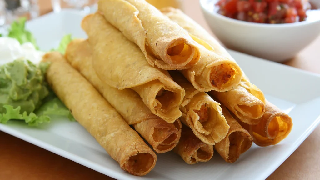 Image of Baked Chicken Taquitos with Guacamole