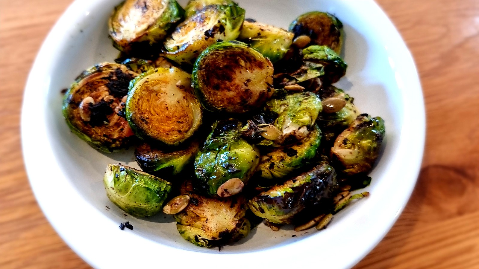 Image of Charred Brussel Sprouts with Black Garlic Puree