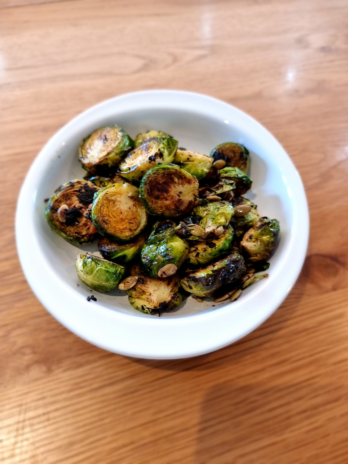 Charred Brussel Sprouts with Black Garlic Puree