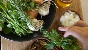 Image of Prepare a bouquet garni tying your herbs with kitchen rope.