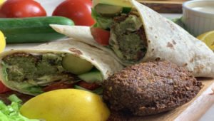 Image of Put two or three falafel and crush them over the...