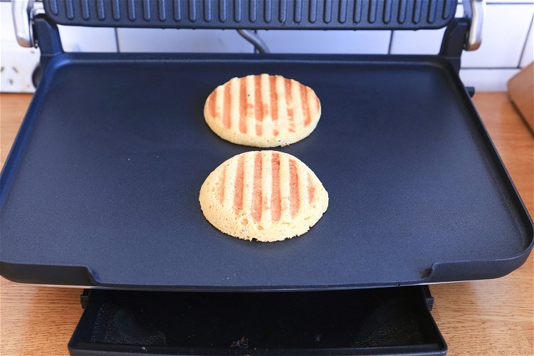 Image of Toast on press grill or toaster.