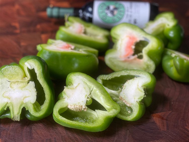 Image of Slice peppers lengthwise, remove seeds and membrane. Blanch them in...
