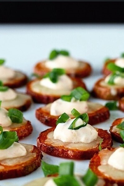 Image of Cheesy Sweet Potato Coins with Chipotle Crema