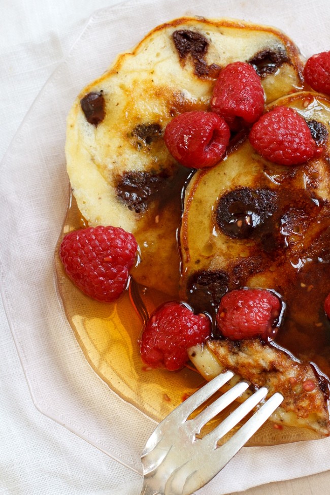 Image of Chocolate Chunk Pancakes with Fresh Raspberry Maple Syrup