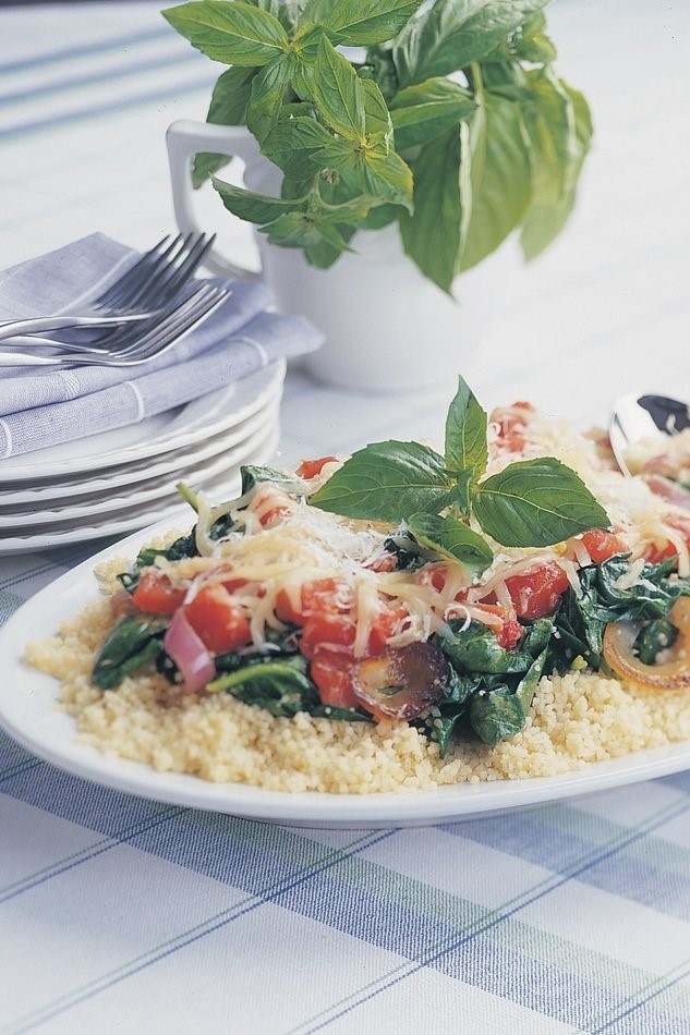 Image of Couscous with Tomatoes, Sautéed Spinach & Two Cheeses