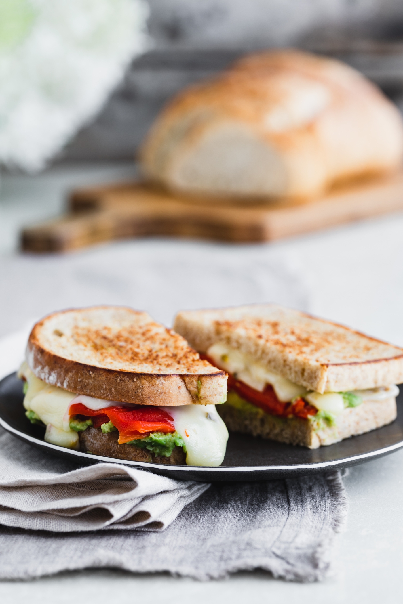 Grilled Cheese with Smashed Avocado and Roasted Red Peppers