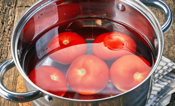 Image of Wash your tomatoes, get a large pot and fill it...