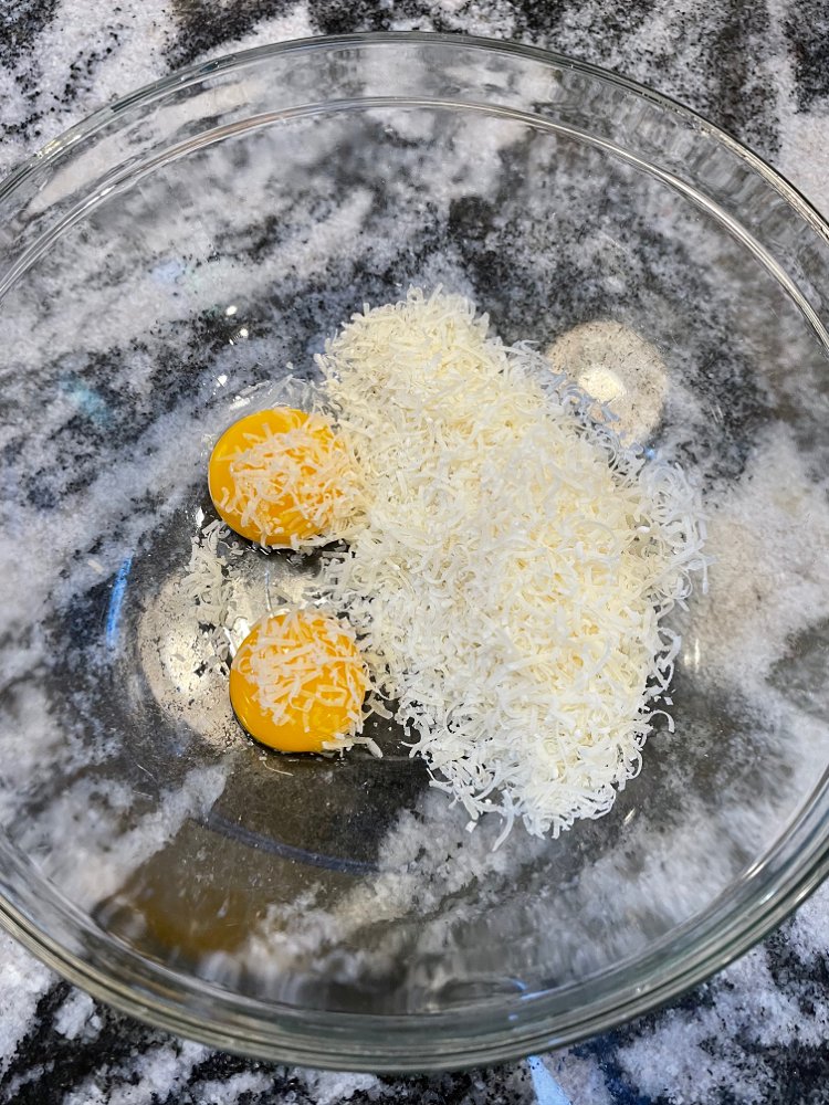 Image of Combine 70-80 grams of parmigiano reggiano and 2 egg yolks...