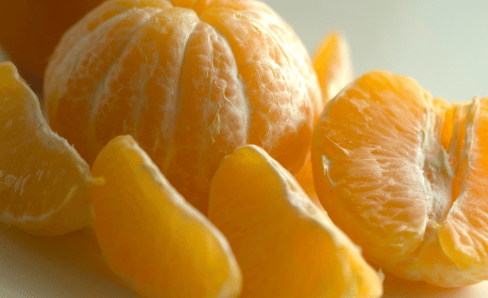 Image of Wash and peel oranges. If you have very small clementines...