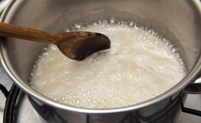 Image of Make the syrup by boiling water and sugar in a...
