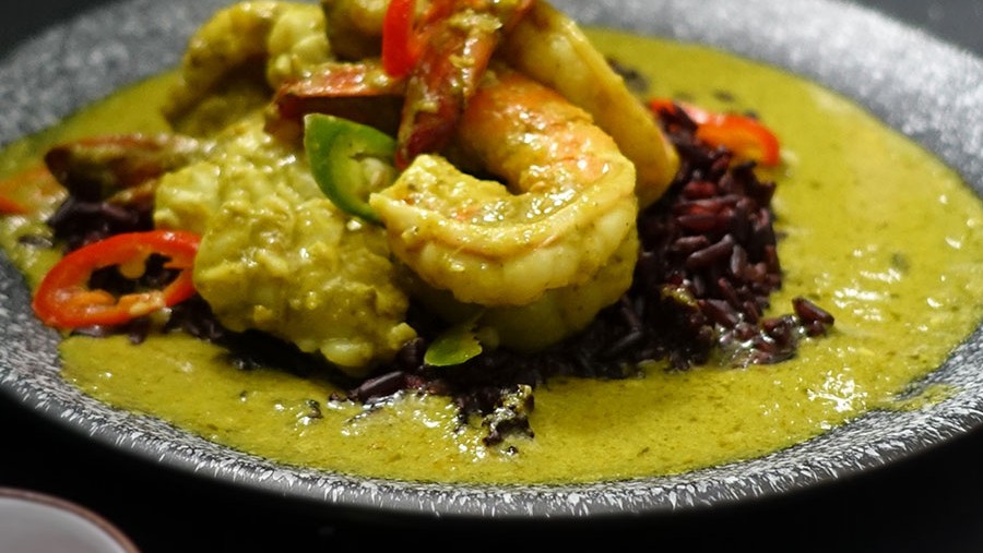 Mixed seafood in Thai green curry paste with black rice