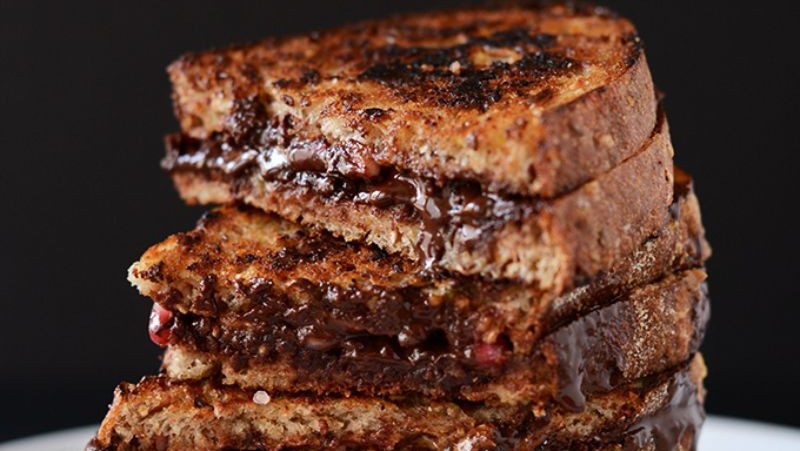 Image of Grilled Almond Butter, Dark Chocolate, & Pomegranate Sandwich