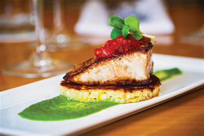 Image of Pan-seared Gulf Amberjack with Griddle Cake, Basil Jalapeño Purée & Tomato Jam