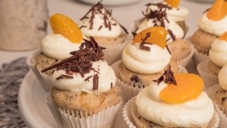 Image of Mandarinen-Schoko-Muffins mit Frischkäse-Crèmehaube