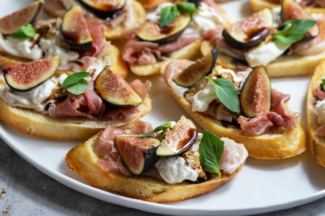 Image of Burrata Prosciutto Fig Crostini