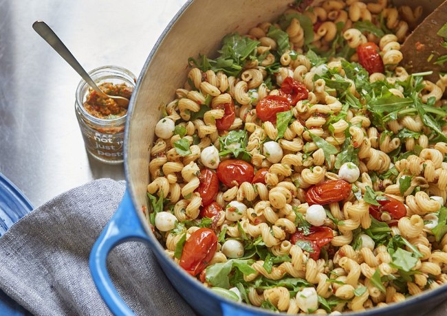 Image of Pesto Pasta with Roasted Tomatoes, Arugula, and Mozzarella