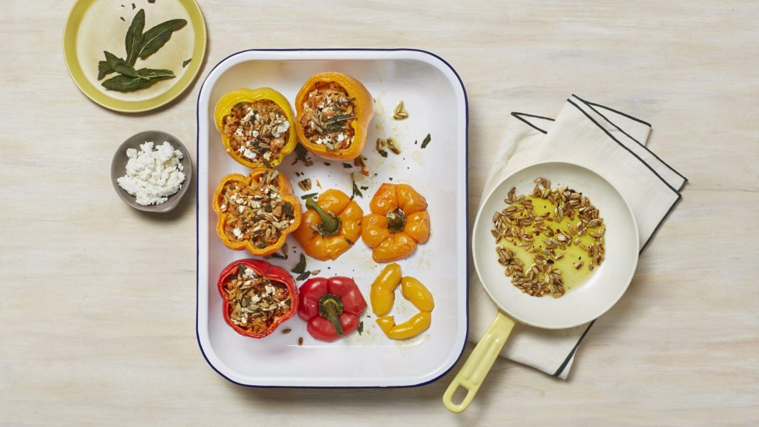 Image of  Stuffed Peppers with Feta, Pepitas, and Chili-Sage Oil