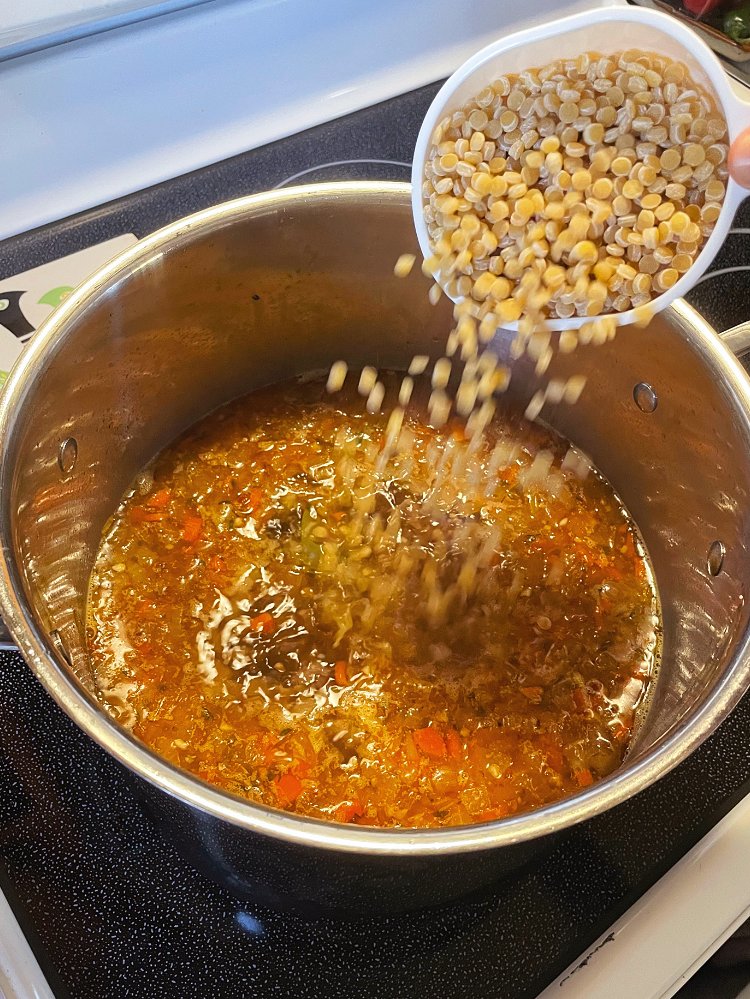 Image of Add couscous and simmer an additional 20-25 minutes until tender.