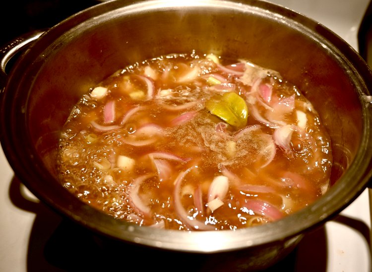 Image of Place mushroom stock in a large pot over medium heat....