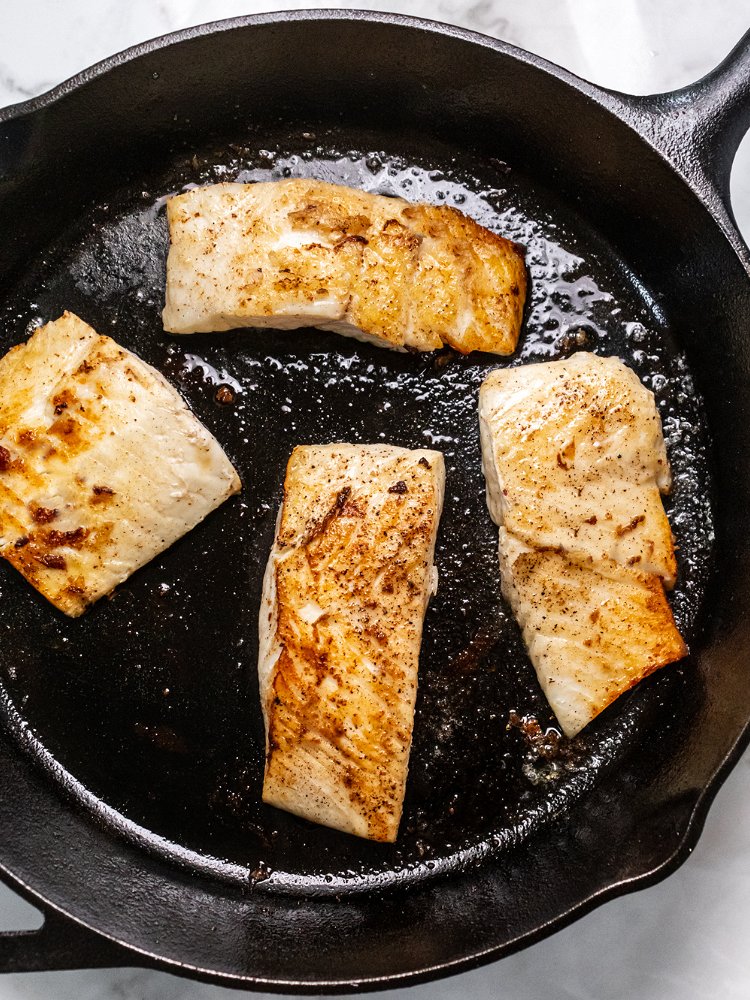 Image of Once butter is sizzling, pan fry the halibut for 4...