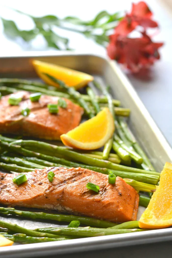 Image of Remove the salmon and asparagus from the grill. Brush the...
