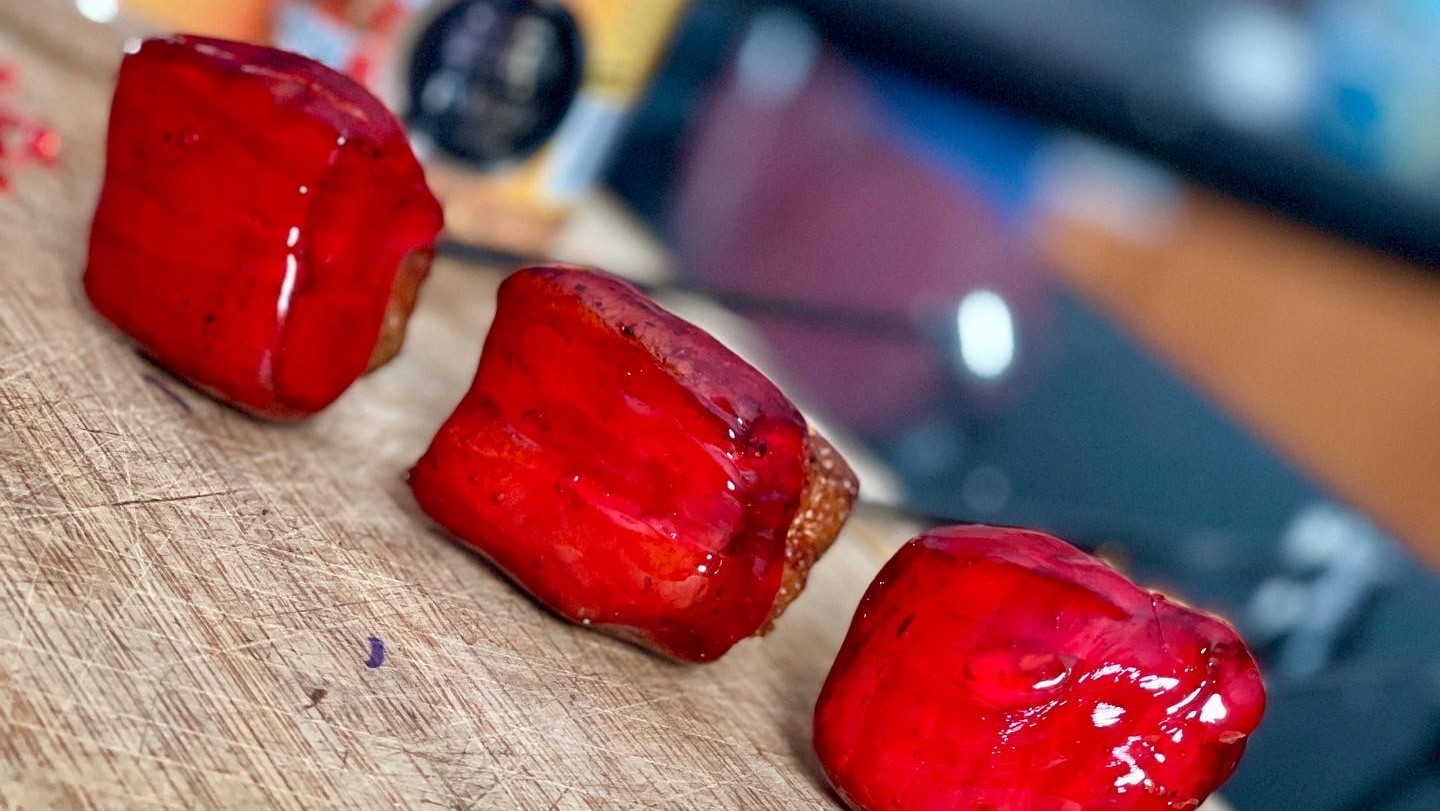 Tanghulu toffee apple style bacon burnt ends on a stick