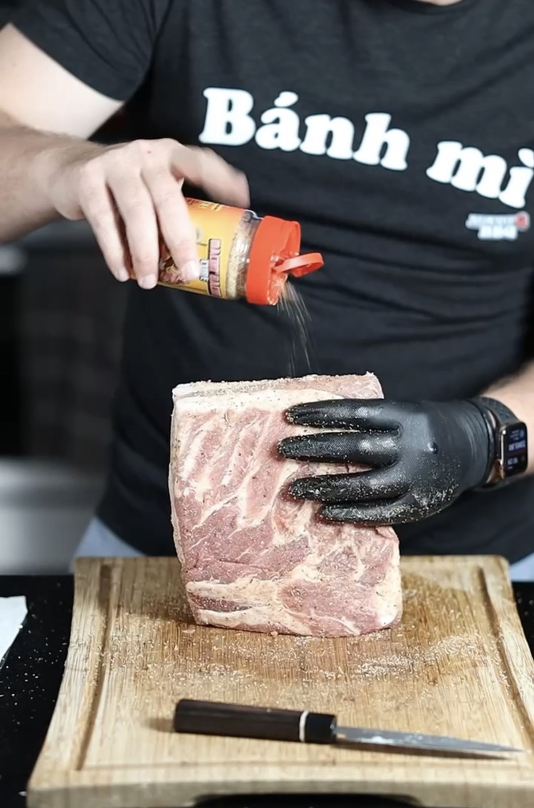 Image of Season the pork belly with Macon bacon until covered evenly