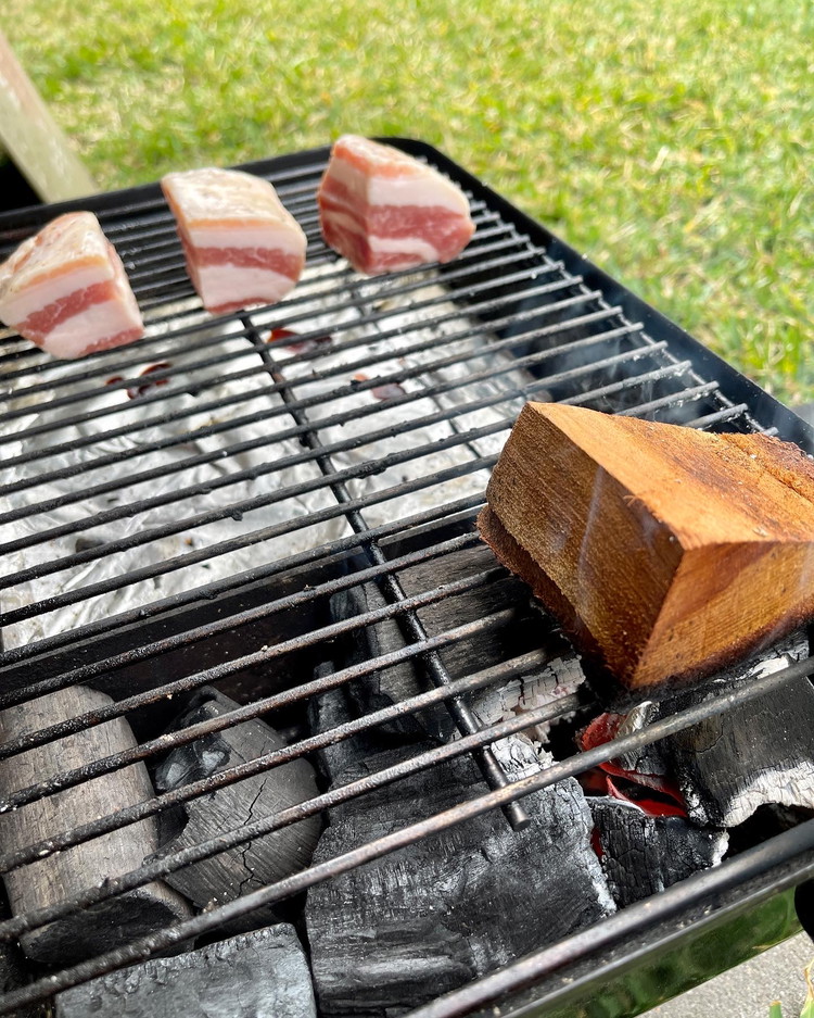 Image of Remove the cure, then onto the smoker/oven at 250F/121C until the internal temperature of the pork belly reaches 150F/65C.