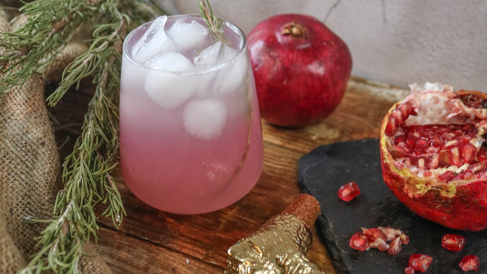 Image of Recipe-138-Pomegranate Gin Fizz with Rosemary Olive Oil Syrup