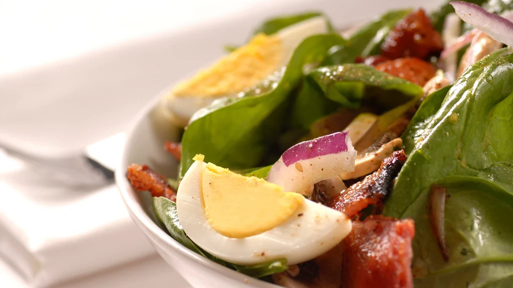 Image of Spinach Salad with Mustard Raisin Dressing