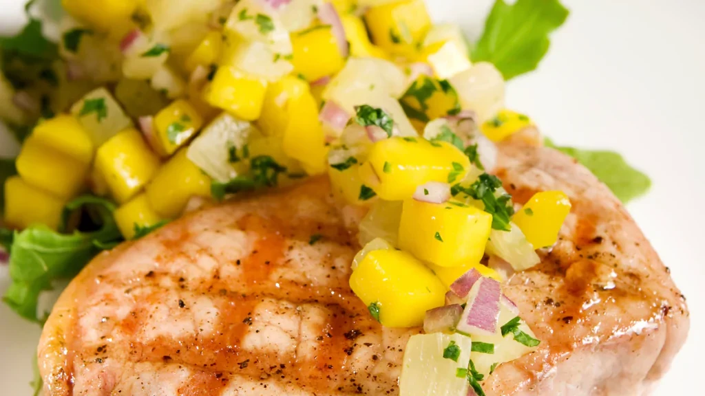 Image of Grilled Pork with Pineapple Mango Salsa