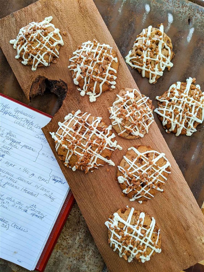 Image of Applesauce-Toffee Cookies with White Chocolate Swizzle