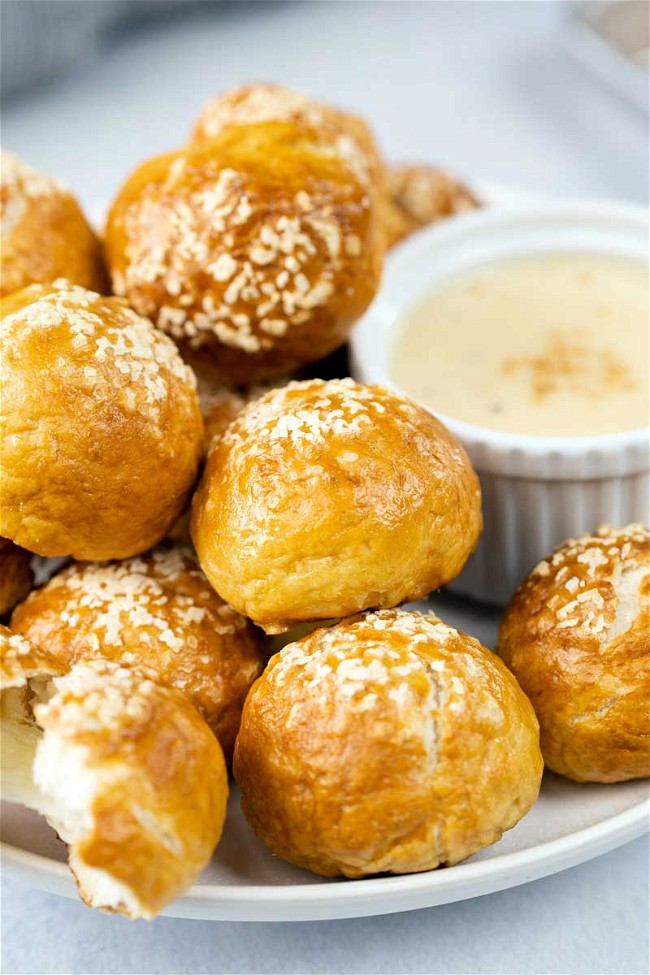 Image of Cheddar Stuffed Pretzel Bites with Cheddar Beer Sauce