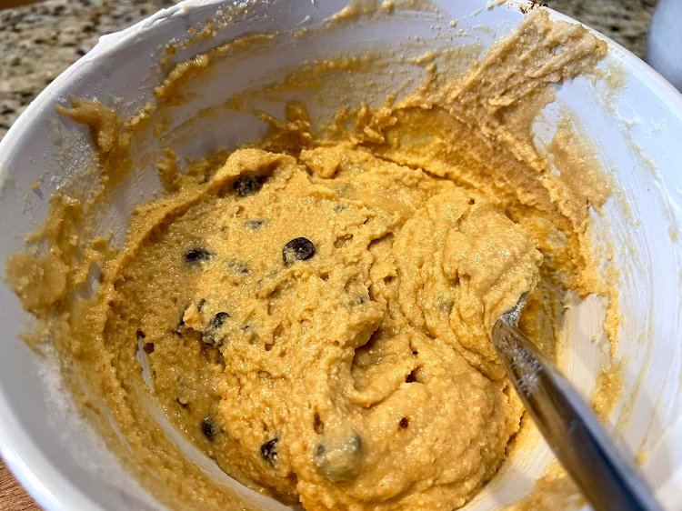 Image of Add dry and wet ingredients together and add chocolate chips