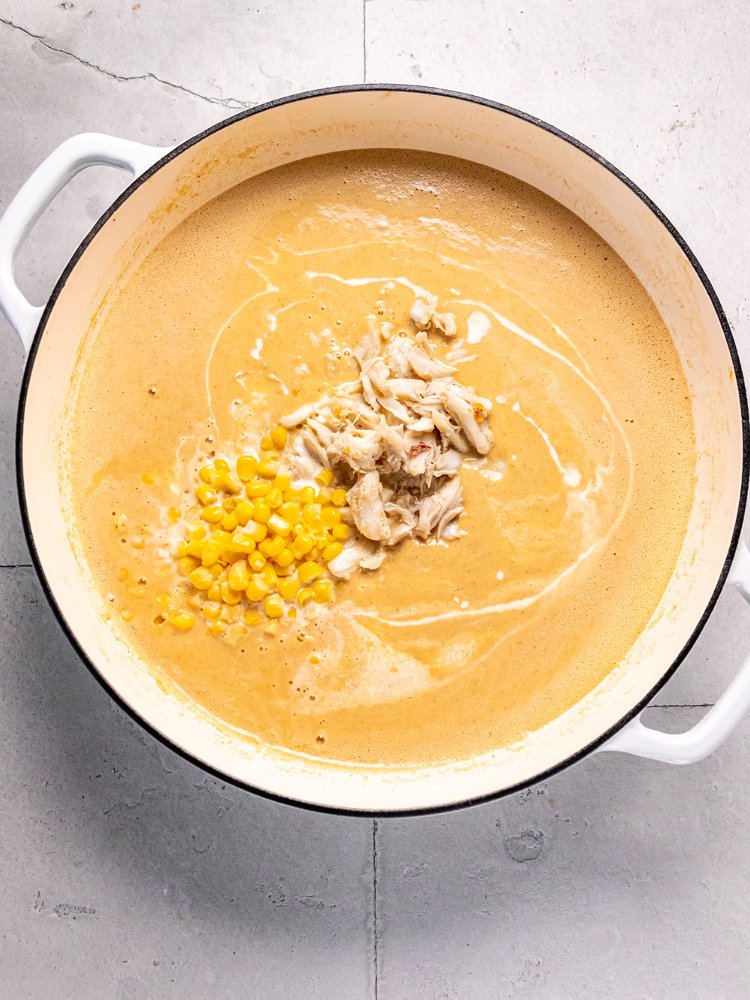 Image of Whisk in heavy cream. Add remaining corn and half of...