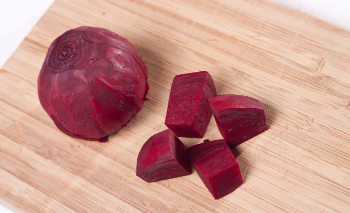 Image of Submerge the beets in a large bowl of ice water,...