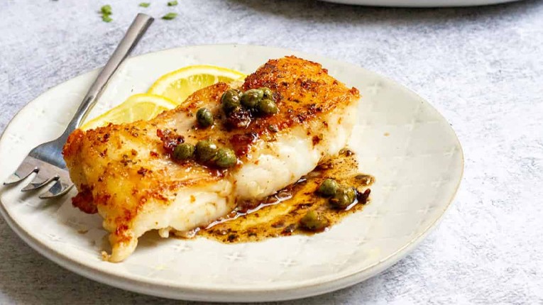 Image of Pan-seared scamp grouper with capers and herbs