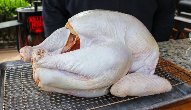 Image of Thaw turkey and remove giblet bag and neck. Place Turkey...