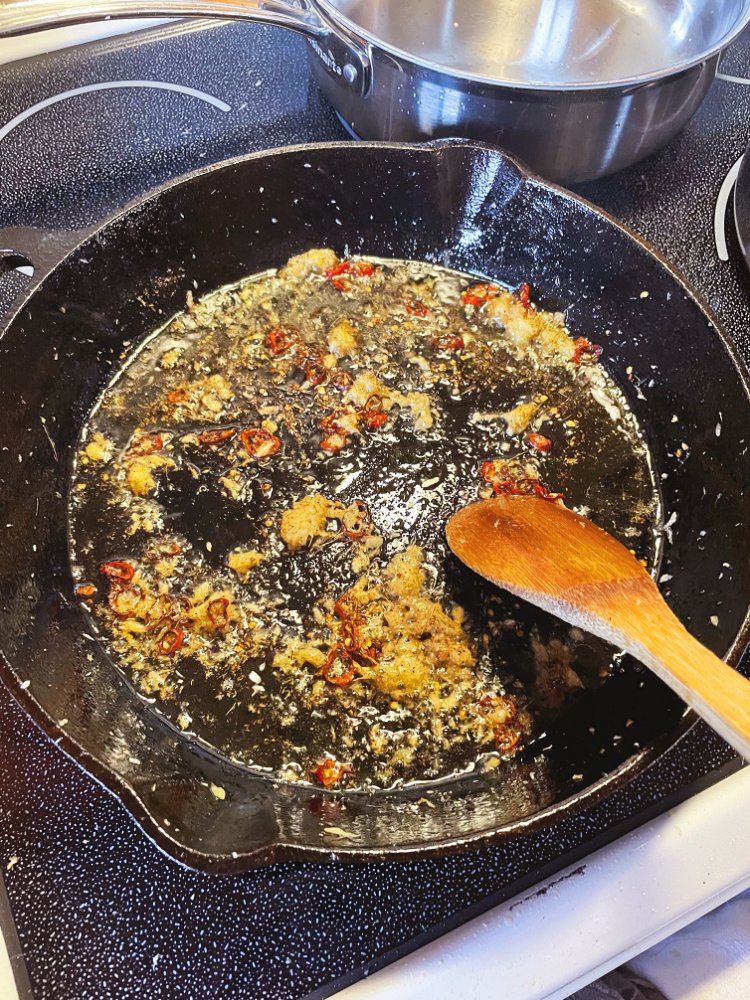 Image of Add oil to a deep pan over medium heat. If...