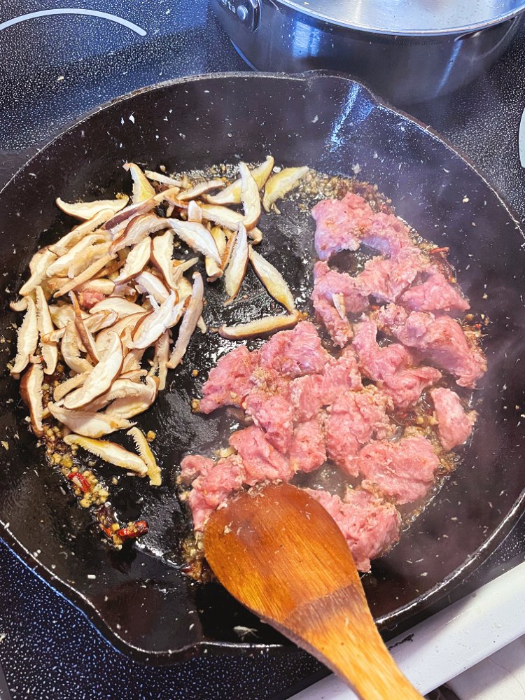 Image of Add garlic and cook until fragrant. Add ground pork and...