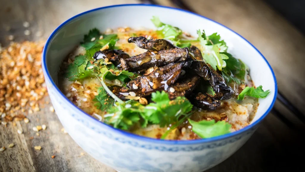 Image of Southeast Asian Porridge with Honey, Sesame Seeds, and Charred Portabella